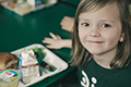 Donation eCard: Girl at school lunch smiling