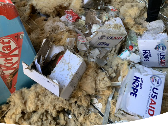 damaged supplies lay in the rubble of Project HOPE's warehouse