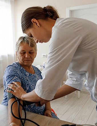 Woman receiving treatment at a Project HOPE Mobile Medical Unit operating in Samoilivka, in the Kharkiv region of Ukraine.